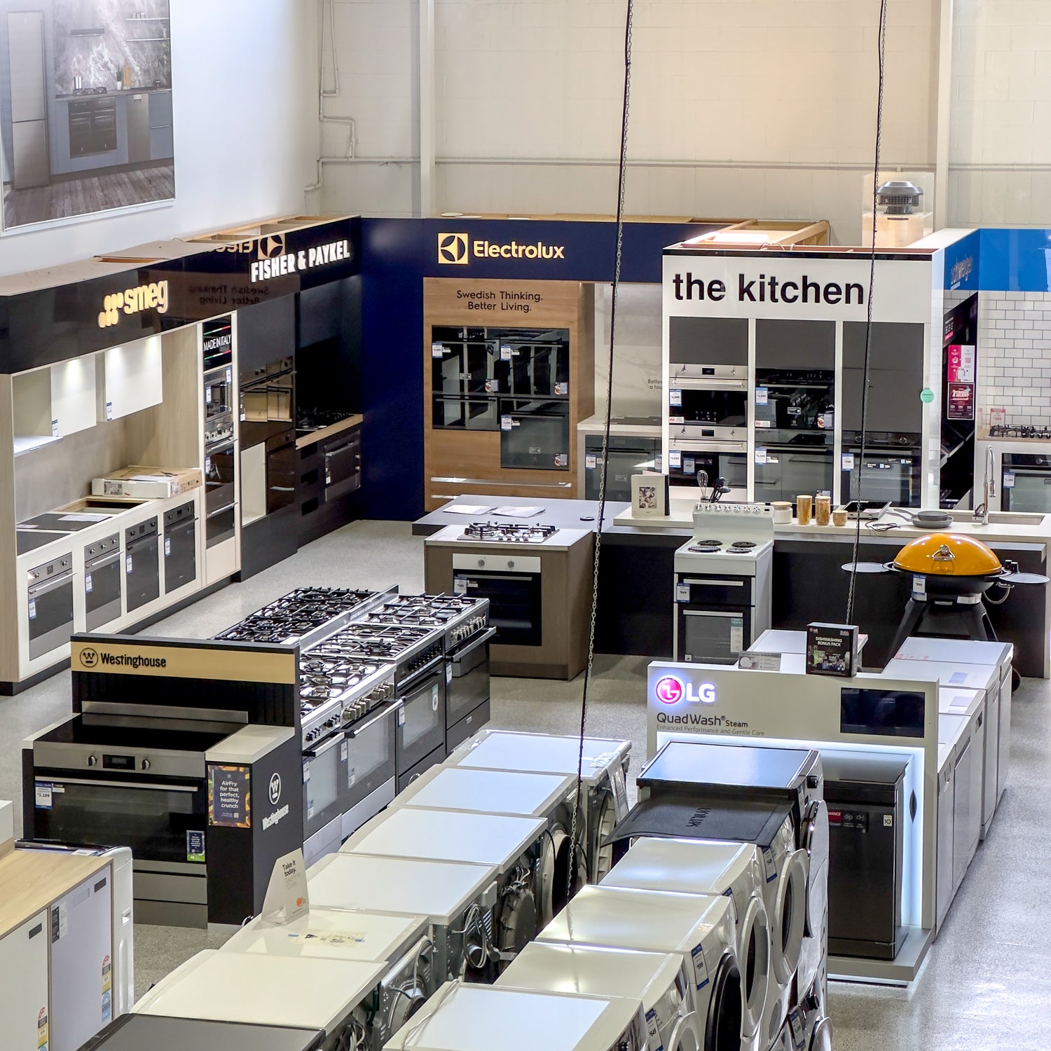 The Save on Appliances showroom with kitchen appliances including ovens, washing machines, and refrigerators from brands like Electrolux, LG, Smeg and Westinghouse